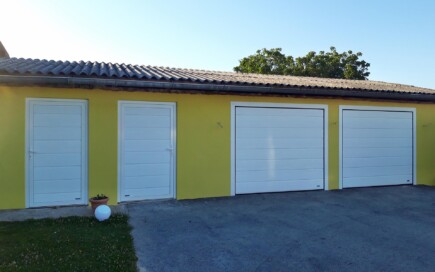 Torcenter Oberwart - Deckensektionaltore Stahl mit Nebentüren